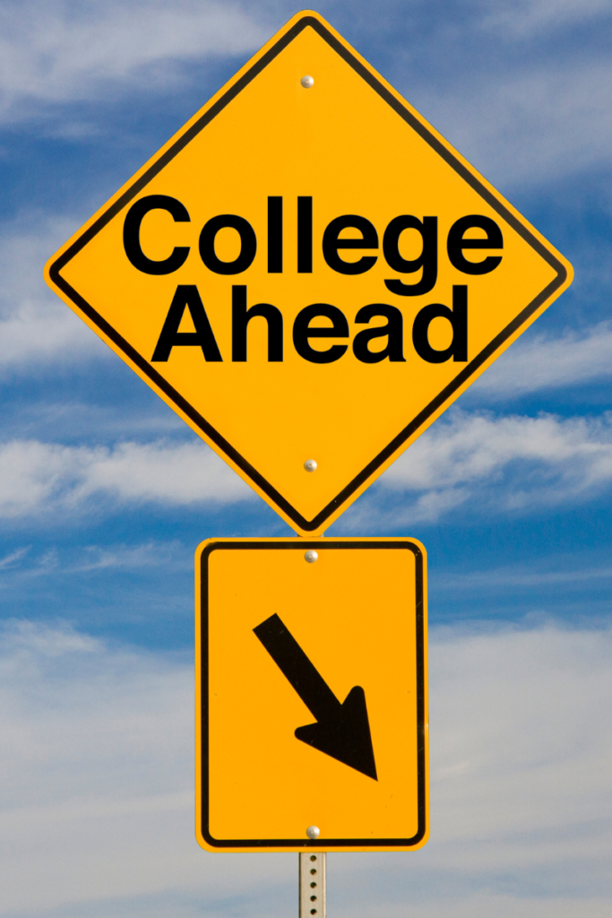 yellow diamond shaped sign reading college ahead with arrow